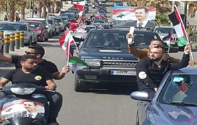 الاحرار اللبنانيون يرفعون صور الأسد وسط بيروت في معقل خصومه
