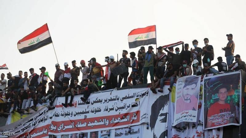 ارتفاع اعداد القتلى في العراق ومتظاهرو بغداد يفتحون شارع 